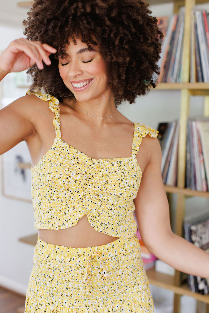 Yellow cropped tank top with flutter sleeve and white floral print allover