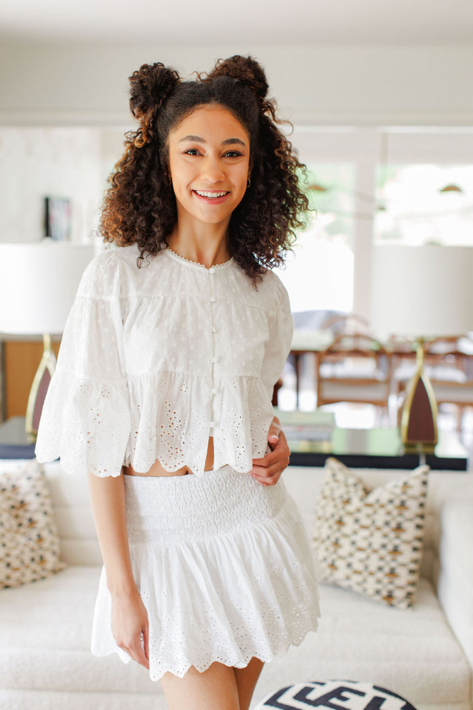 White lace and eyelet button up top with longer flutter sleeve 