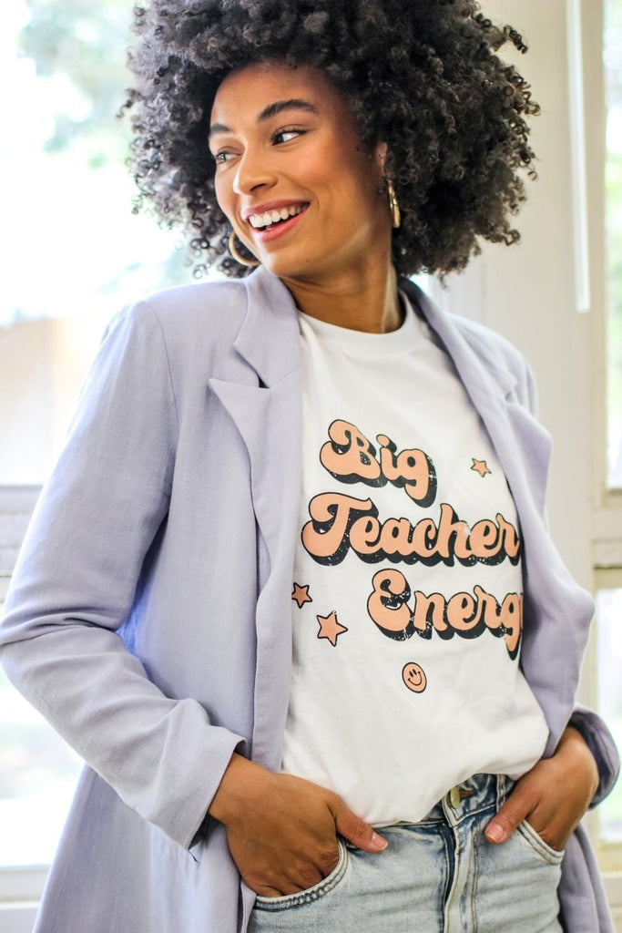 White t-shirt with "Big Teacher Energy" in a fun bubble font; perfect for all of our teachers