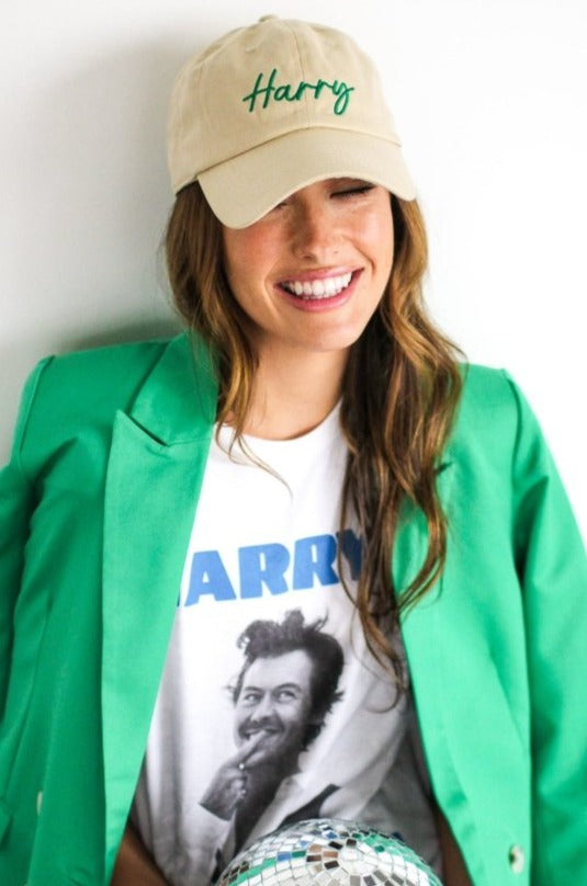 Harry Styles inspired baseball cap with emerald green embroidery. Harry Styles Merch